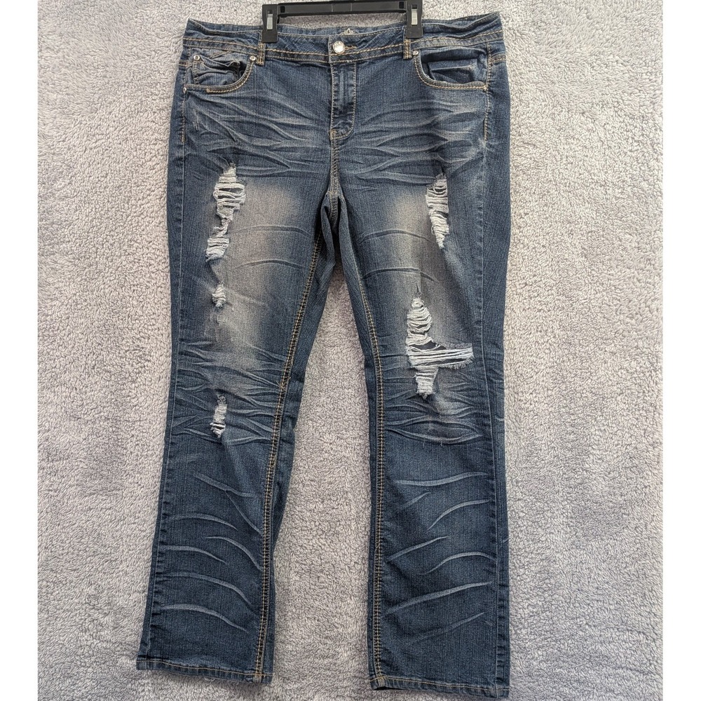 Distressed Women's Blue Denim Jeans - Classic Ripped Style